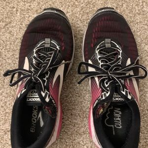 Pink and Black Brooks running shoes